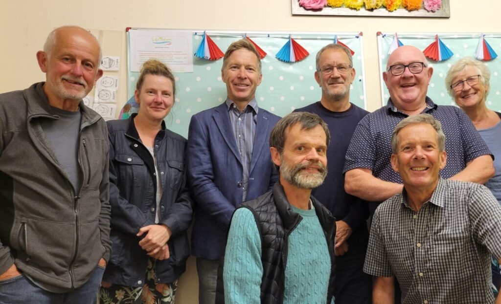 Group of 9 People (The Trustees)