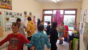 A group practicing a Barn Dance